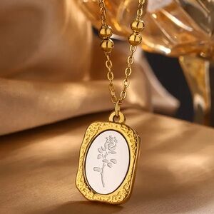Elegant Gold and Silver Pendant Necklace